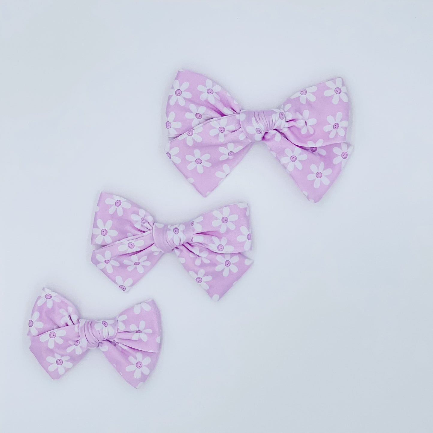 Purple Smiley Flower Bow